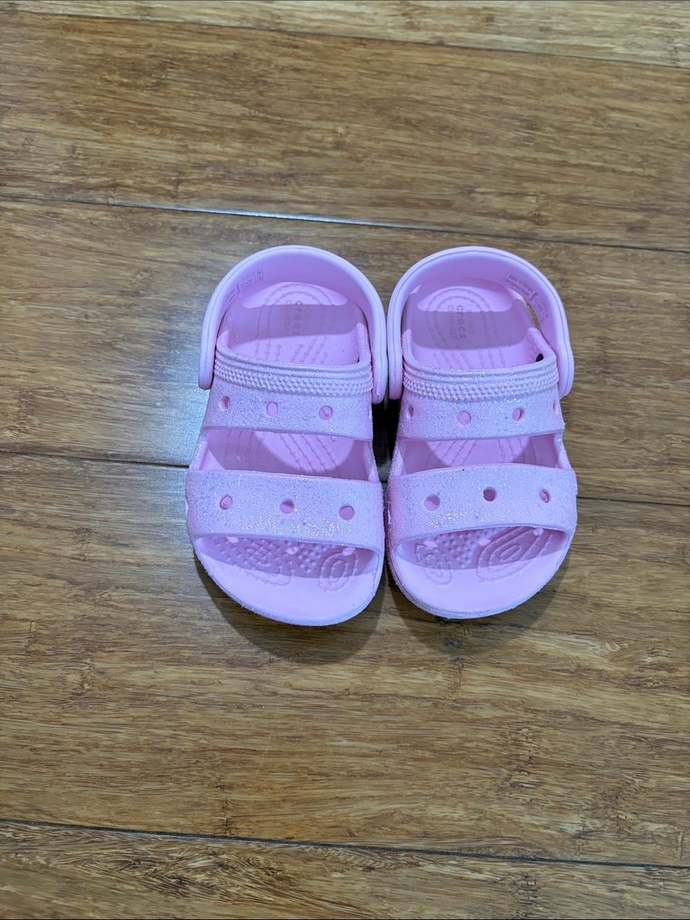 Pink croc slides